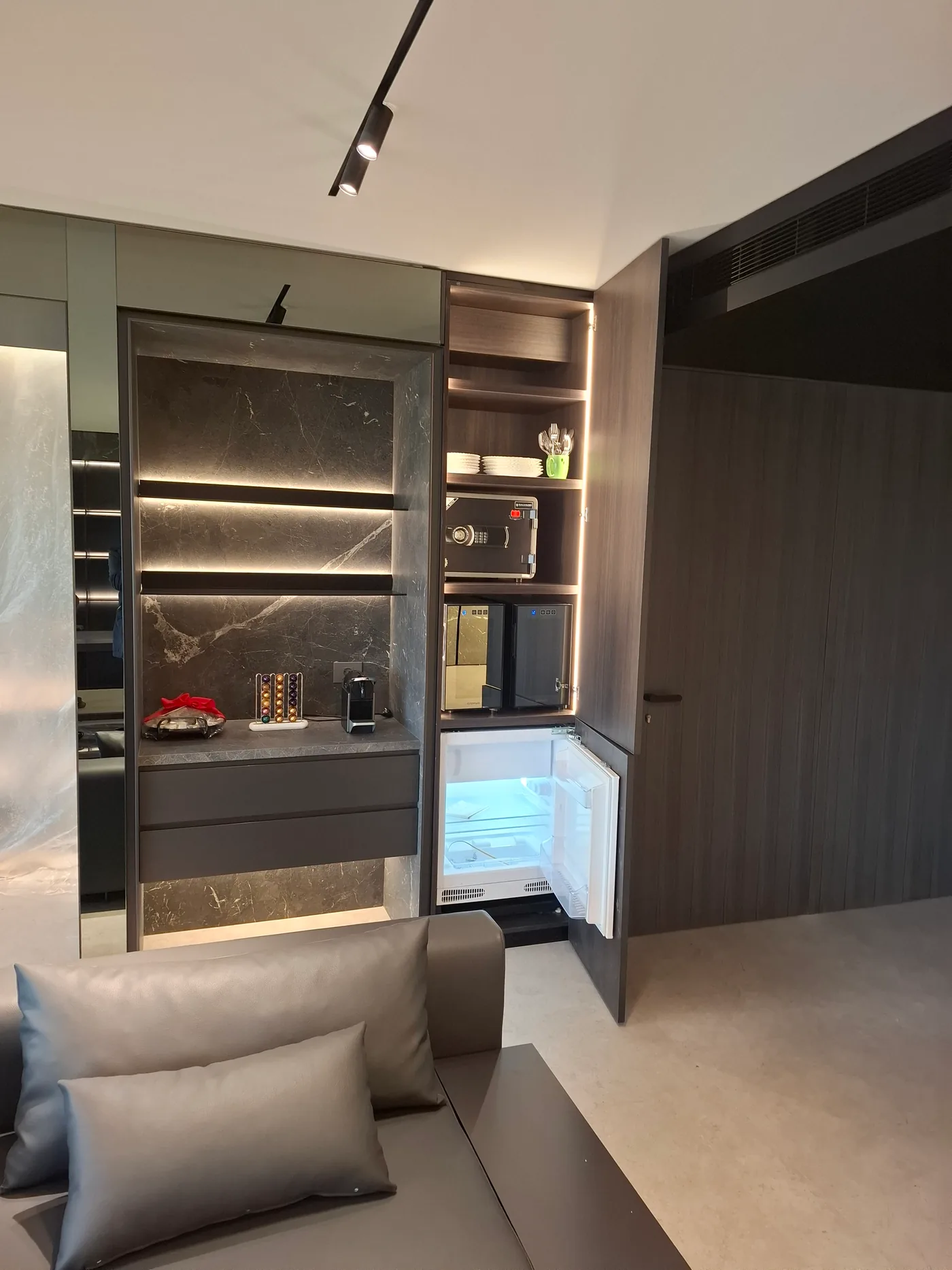 Bar cabinet with integrated fridge and safe