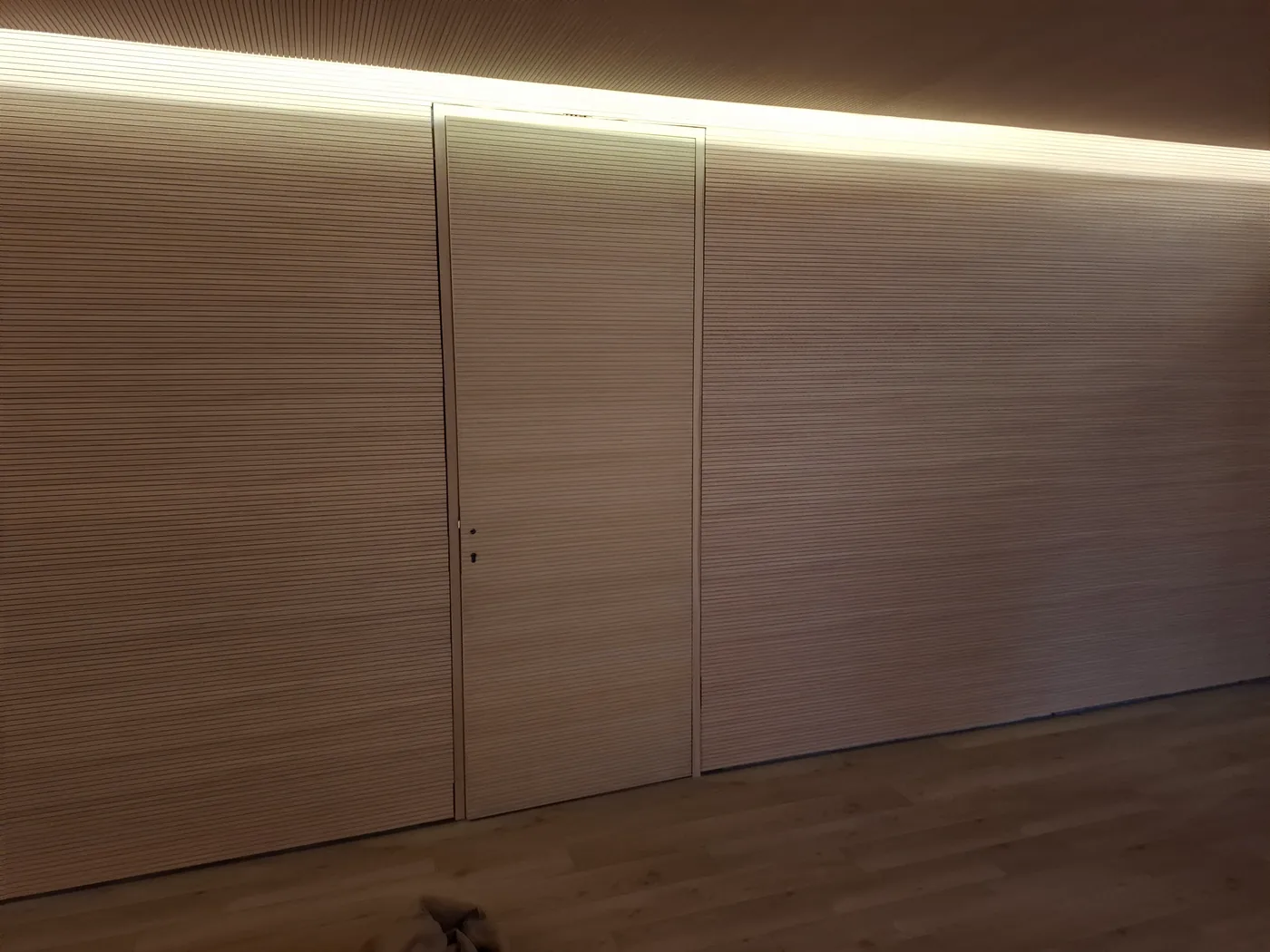 Fluted panelling with a flush-fitted door